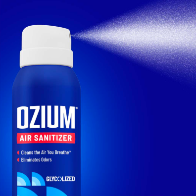 Ozium air sanitizer can spraying into air